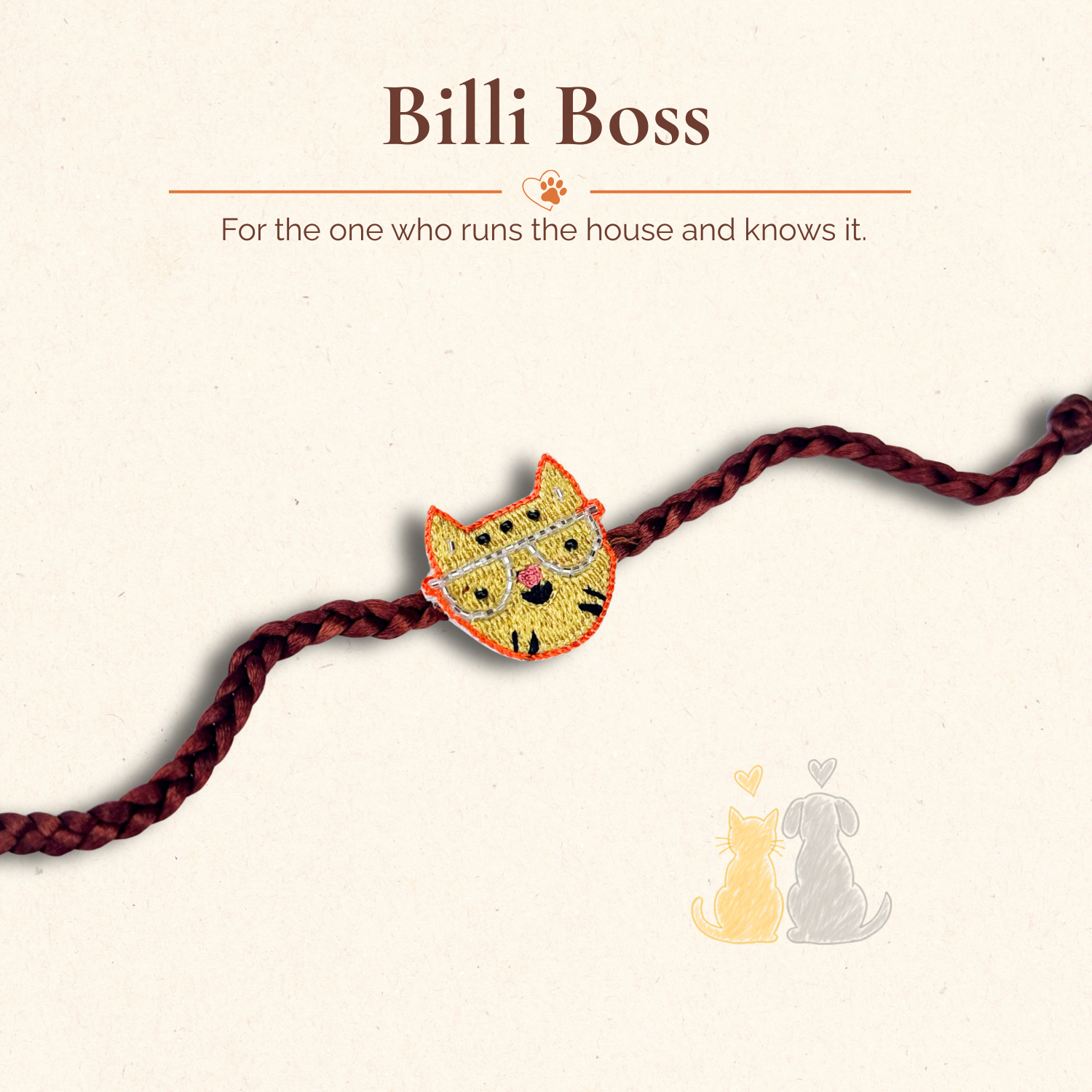 Hand-embroidered cat face rakhi with bead detail, close-up