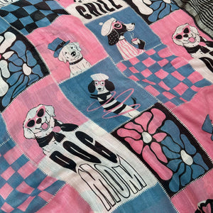 Dog Mom Actually pink blue patchwork dog print saree closeup with illustrated dog panels and black zari pallu, Zoomies Collection Thread Weavers