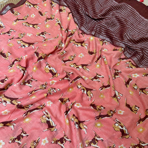 Ears First coral cotton beagle print saree closeup with daisy florals and dark maroon zari pallu, Zoomies Collection by The Thread Weavers