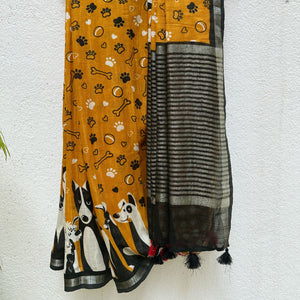 Golden Paws mustard cotton dog print saree with paw print bone motifs, illustrated dog border and black zari pallu, Zoomies Collection