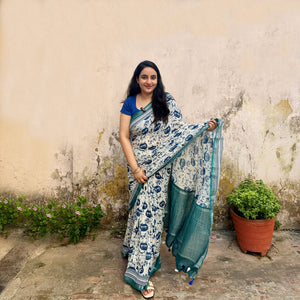 Founder wearing Catsablanca ivory cotton saree with navy meow cat face print, chevron border and teal zari pallu, Zoomies Collection by Thread Weavers