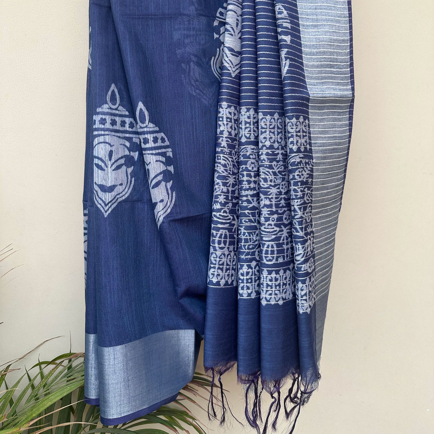 Pleats detail of Kathakali mask block print on indigo cotton silk – Aadya