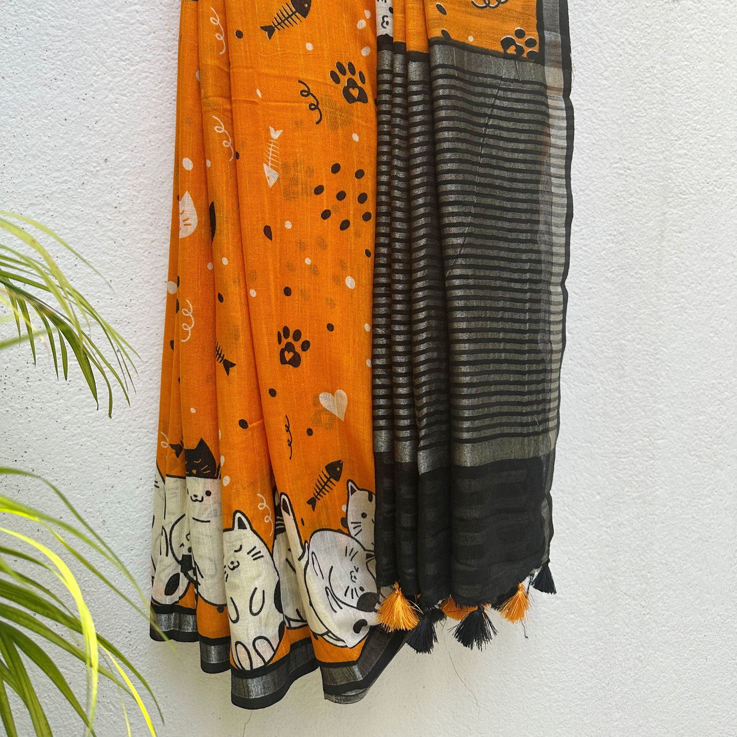 Amber & Aloof amber cotton cat print saree with fishbone motifs, sleeping cat border and black zari pallu, Zoomies Collection TTW