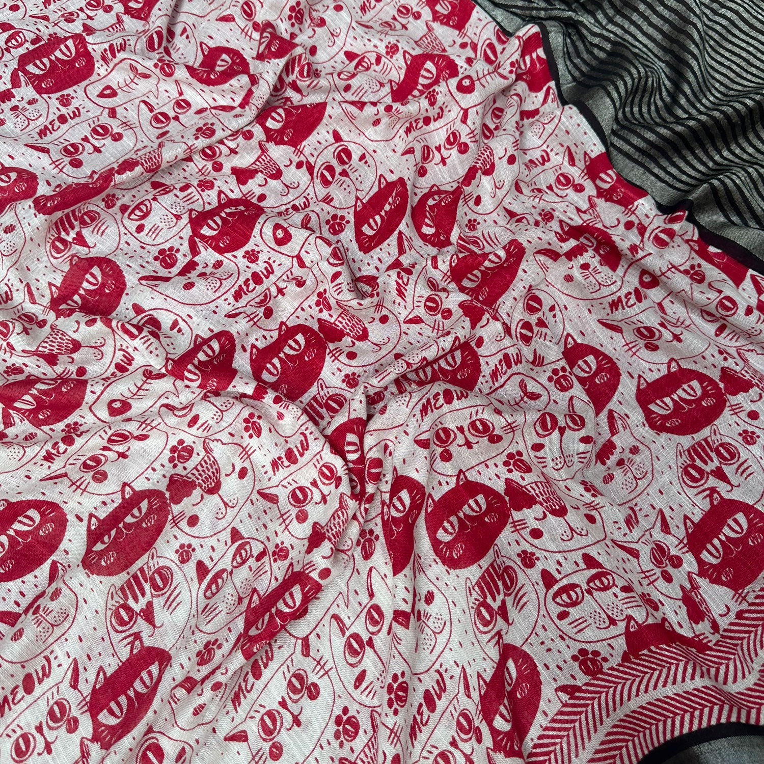 Cat Got Your Heart cotton saree in red and white cat print with black border closeup detailing,  by The Thread Weavers