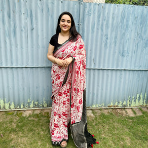 Founder wearing Cat Got Your Heart cotton saree in red and white cat print with black border, styled with black blouse, by The Thread Weavers