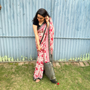 Founder wearing Cat Got Your Heart cotton saree in red and white cat print with black border, styled with black blouse, by The Thread Weavers