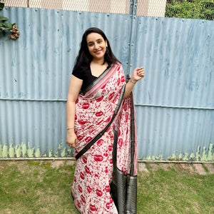 Founder wearing Cat Got Your Heart cotton saree in red and white cat print with black border, styled with black blouse, by The Thread Weavers
