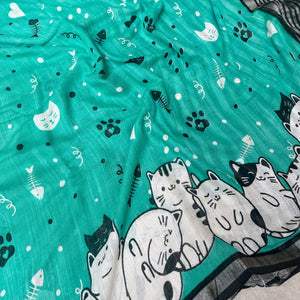 Cat Nap Playtime teal cotton print saree closeup with fishbone motifs, sleeping cat border and black stripe zari pallu, Zoomies Collection