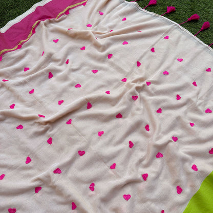 Closeup of mul cotton saree in guava pink and lime green, designed for effortless everyday elegance.