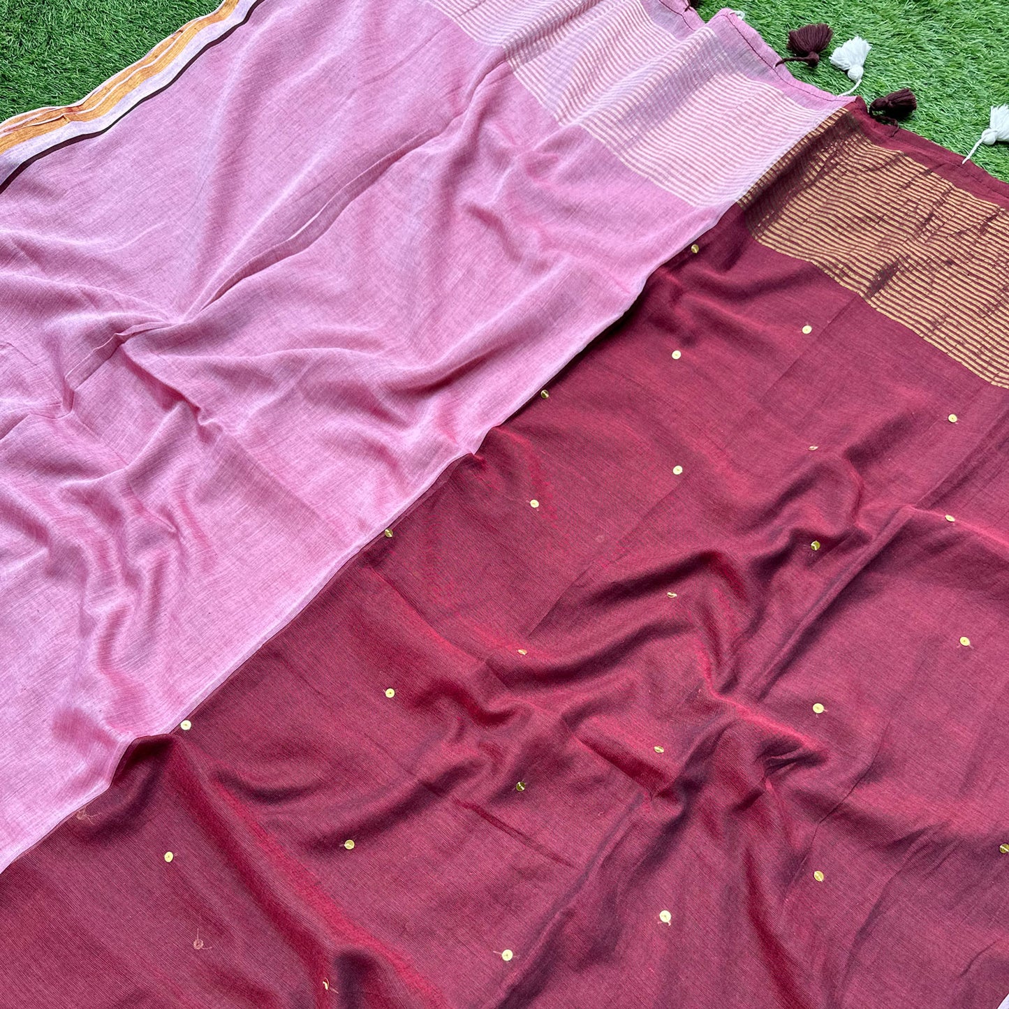 Delicate sequin embroidery on Gulaabi Shaam mul cotton saree in rich wine and blush pink colour palette.
