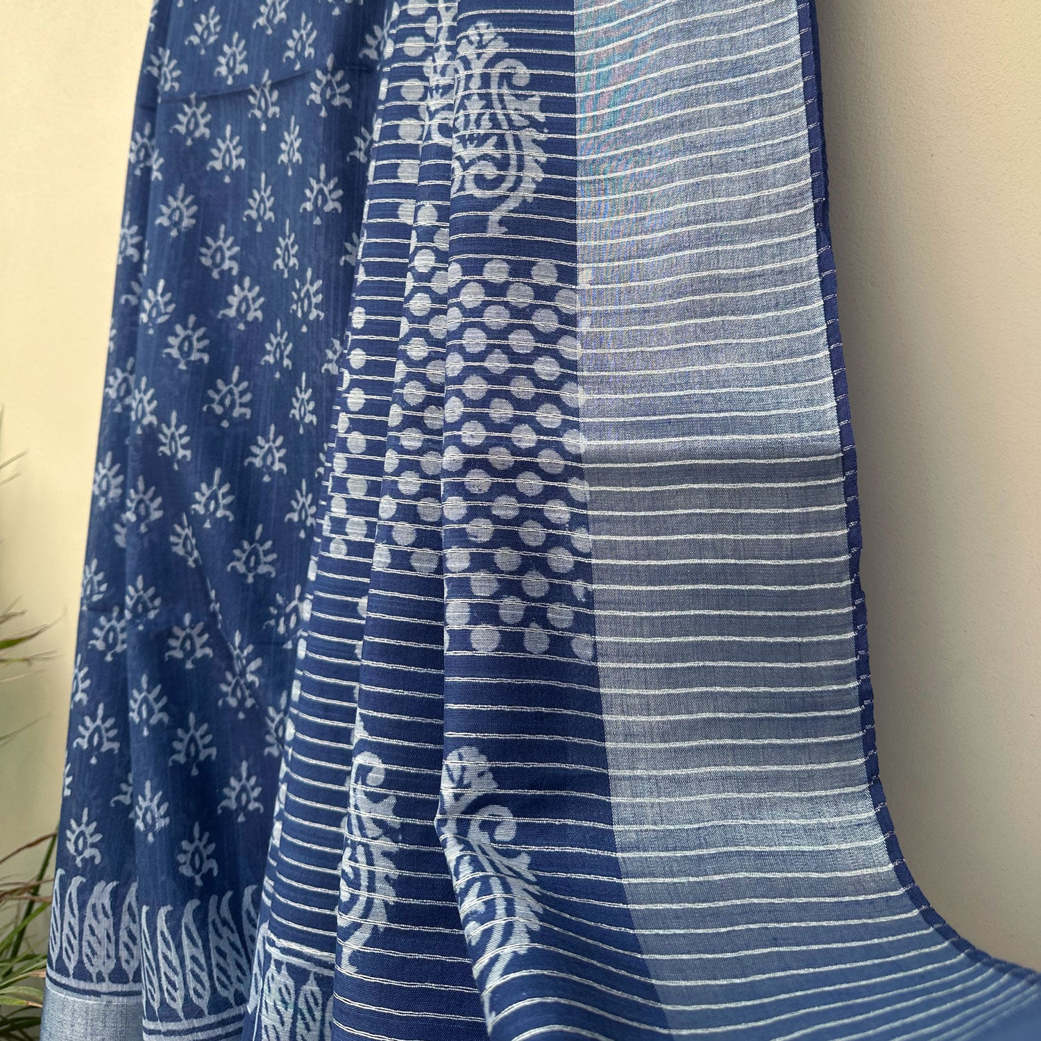 Peacock motif pallu with diagonal polka dot lattice border on indigo cotton silk – Manah by The Thread Weavers