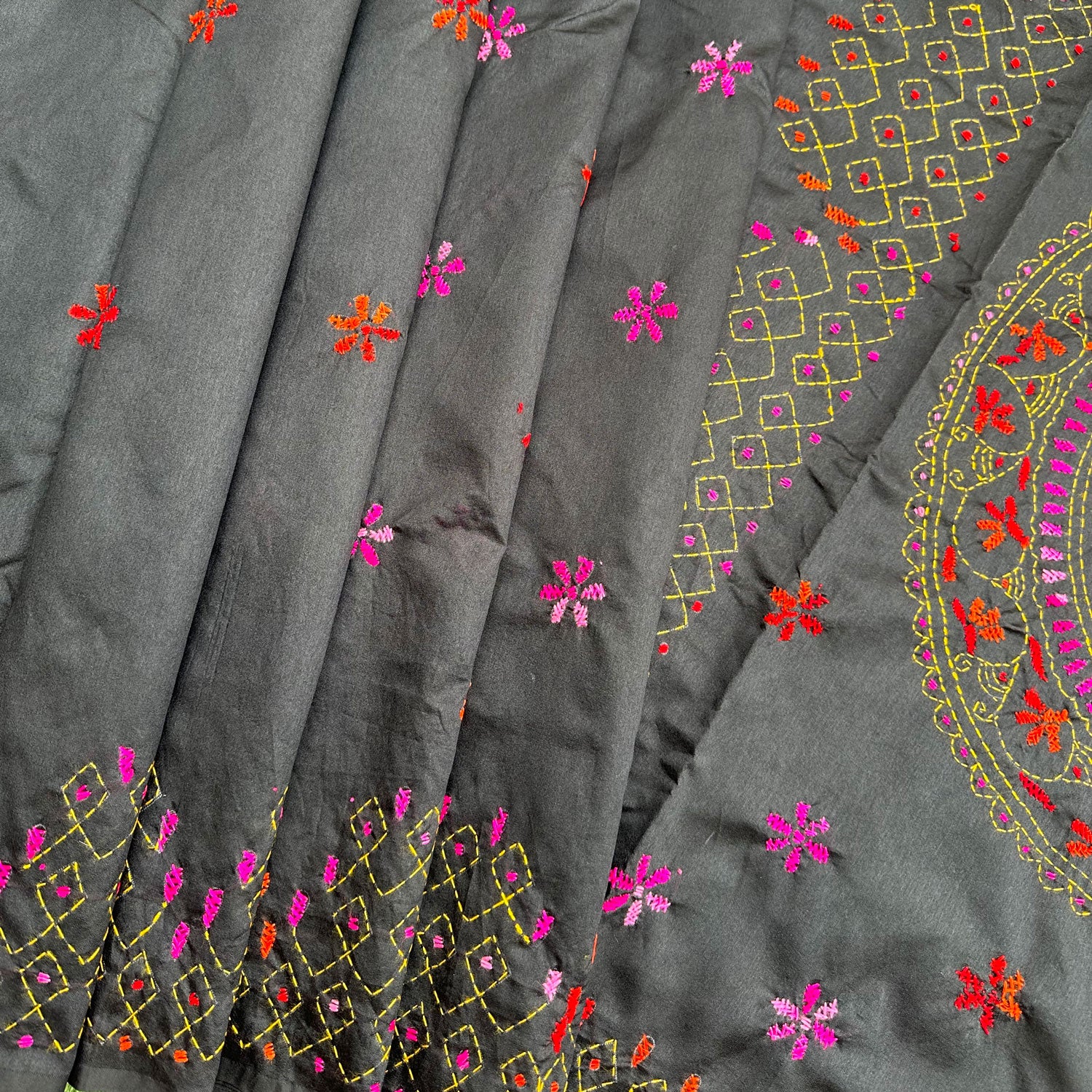 Artisan-made Kantha embroidered saree with statement mandala motif and geometric hand-stitched borders.