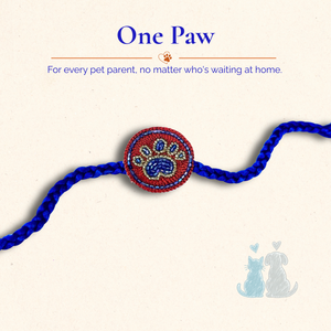Hand-embroidered paw rakhi, close-up beadwork detail