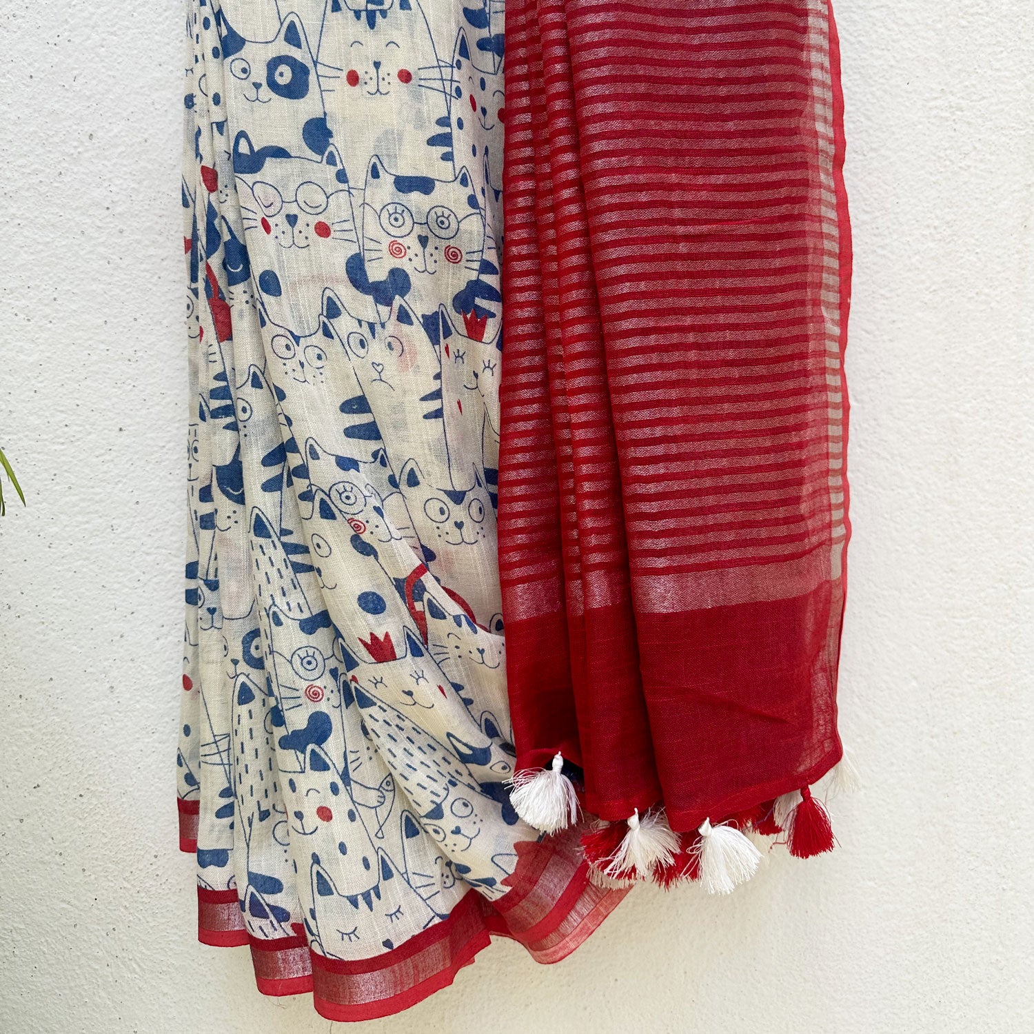Purr-suasion ivory cotton saree with blue illustrated cat crowd print and bold red zari pallu, Zoomies Collection by Thread Weavers