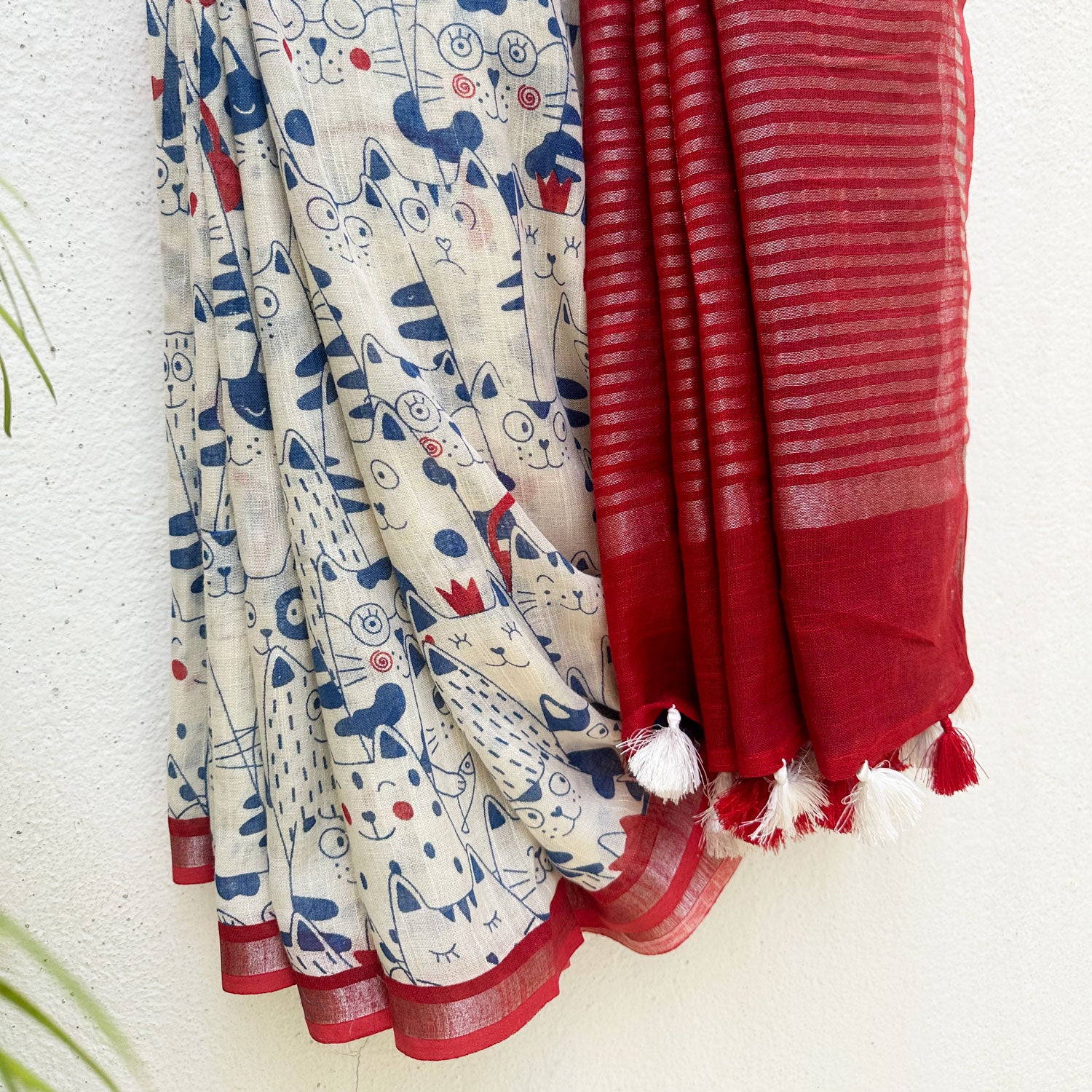Purr-suasion ivory cotton saree with blue illustrated cat crowd print and bold red zari pallu, Zoomies Collection by Thread Weavers