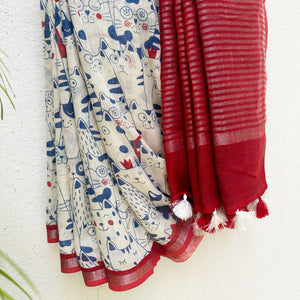 Purr-suasion ivory cotton saree with blue illustrated cat crowd print and bold red zari pallu, Zoomies Collection by Thread Weavers