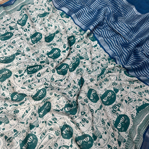 Say It Louder ivory cotton saree closeup with teal meow cat face print, chevron border and navy zari pallu, Zoomies Collection Thread Weavers
