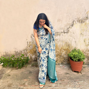 Founder wearing Catsablanca ivory cotton saree with navy meow cat face print, chevron border and teal zari pallu, Zoomies Collection by Thread Weavers