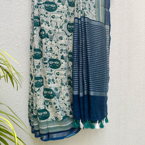 Say It Louder ivory cotton saree with teal meow cat face print, chevron border and navy zari pallu, Zoomies Collection Thread Weavers