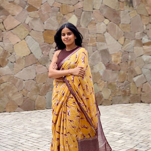 Sniff & Seek mustard orange cotton beagle print saree with daisy florals and dark brown zari pallu, Zoomies Collection by The Thread Weavers