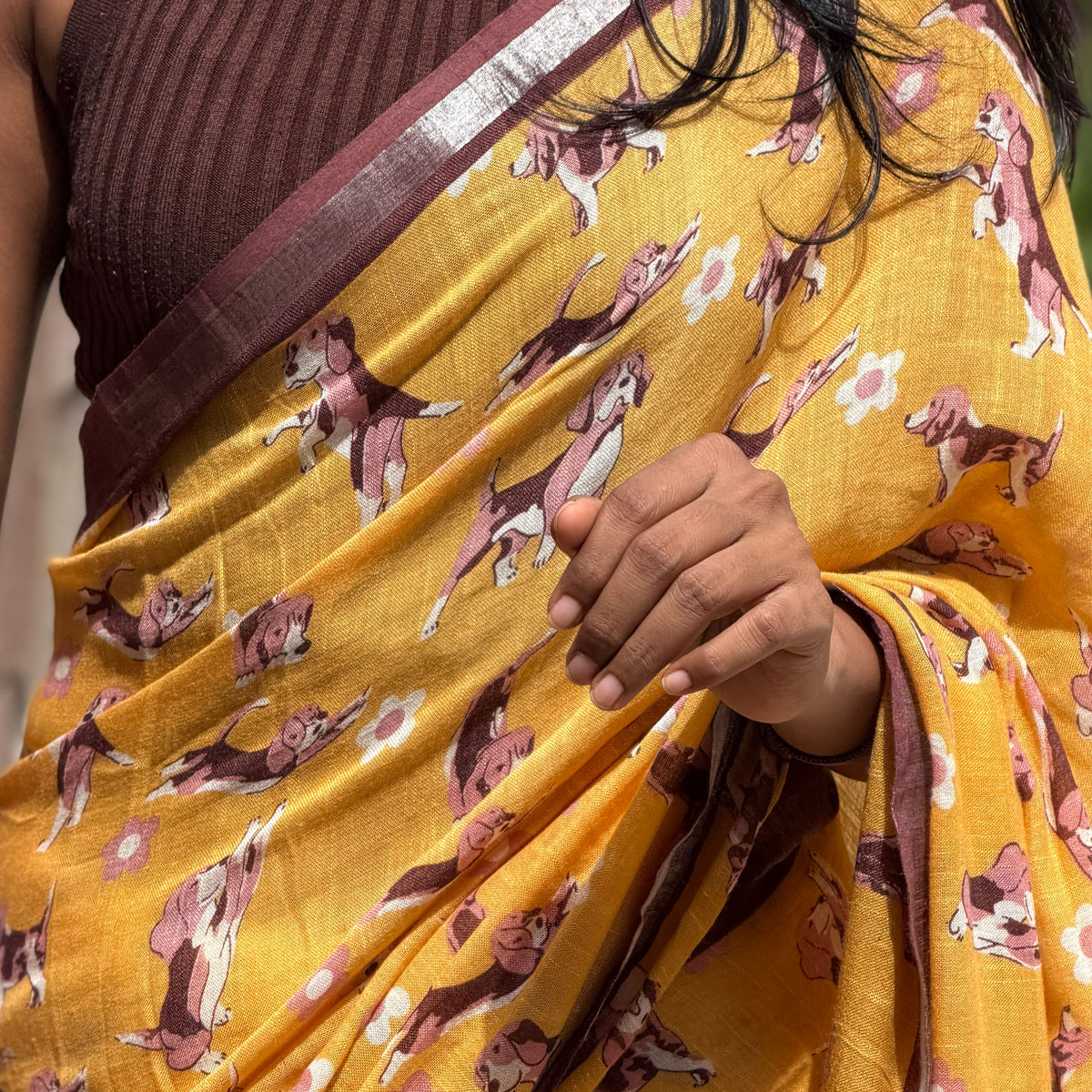 Sniff & Seek mustard orange cotton beagle print saree with daisy florals closeup, Zoomies Collection by The Thread Weavers