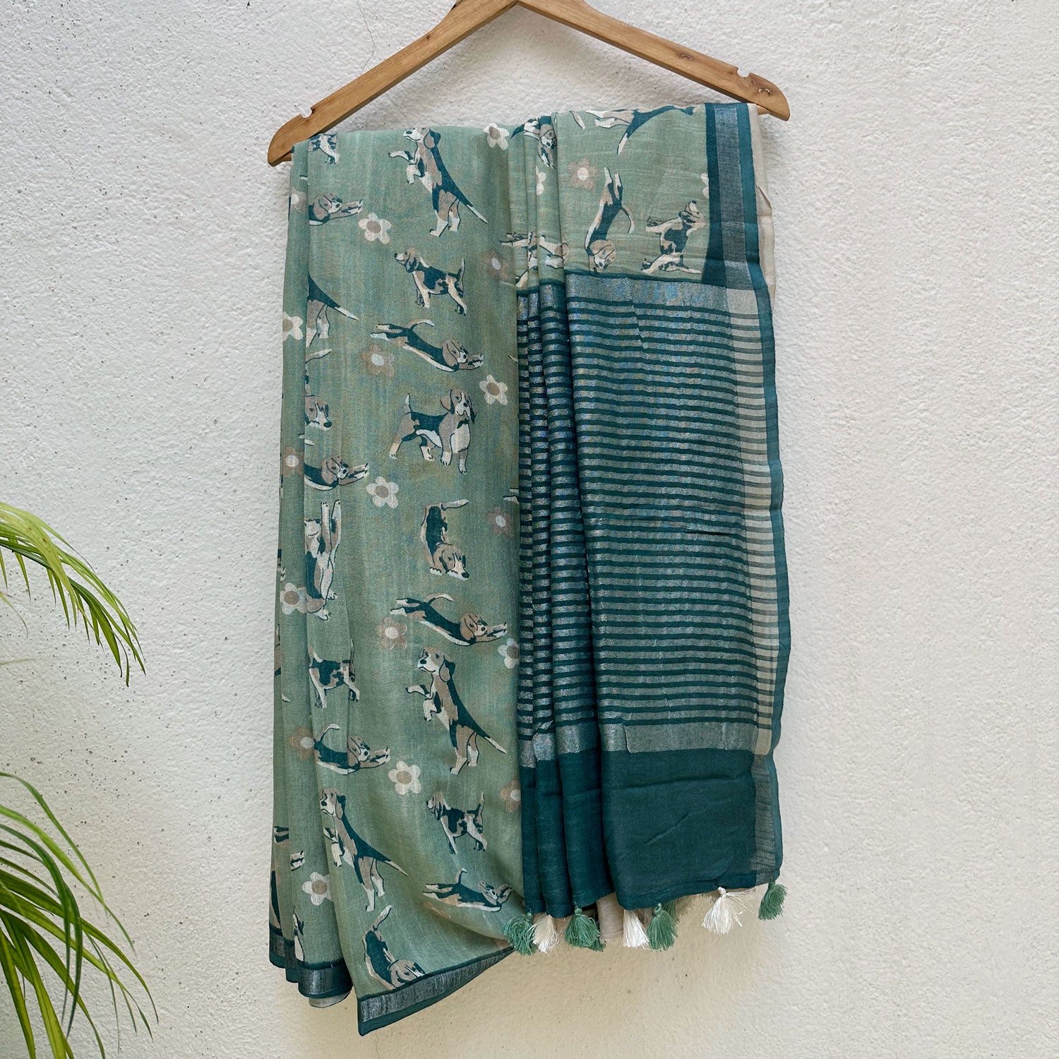 The Biscuit Hour sage green cotton beagle print saree with daisy florals and dark teal zari pallu, Zoomies Collection Thread Weavers