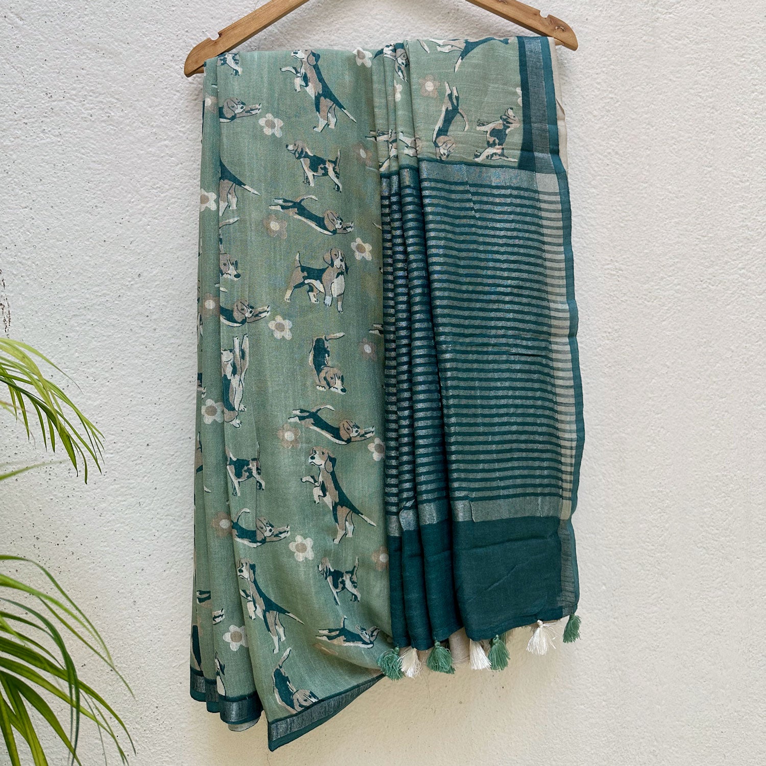The Biscuit Hour sage green cotton beagle print saree with daisy florals and dark teal zari pallu, Zoomies Collection Thread Weavers
