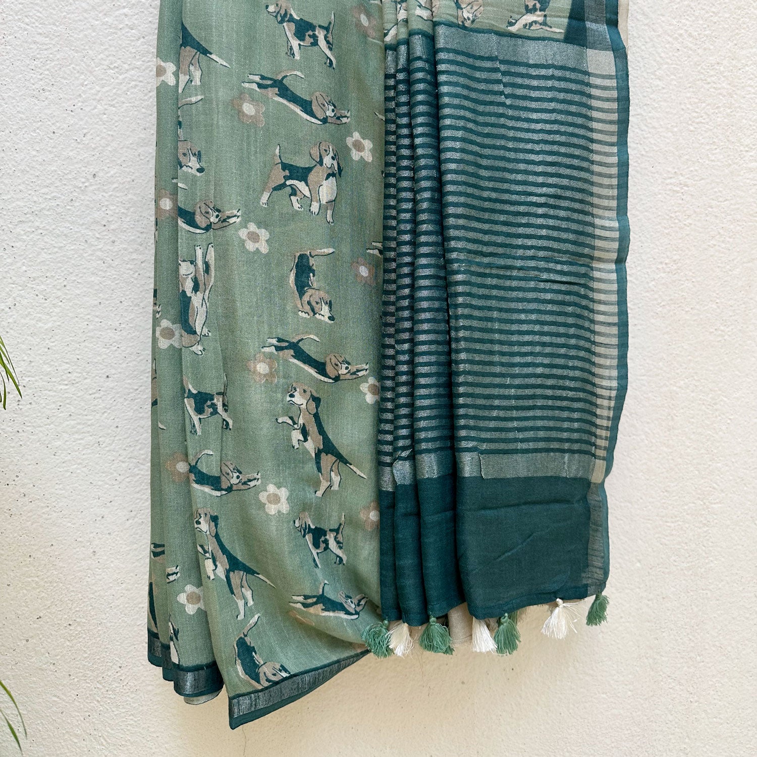 The Biscuit Hour sage green cotton beagle print saree with daisy florals and dark teal zari pallu, Zoomies Collection Thread Weavers