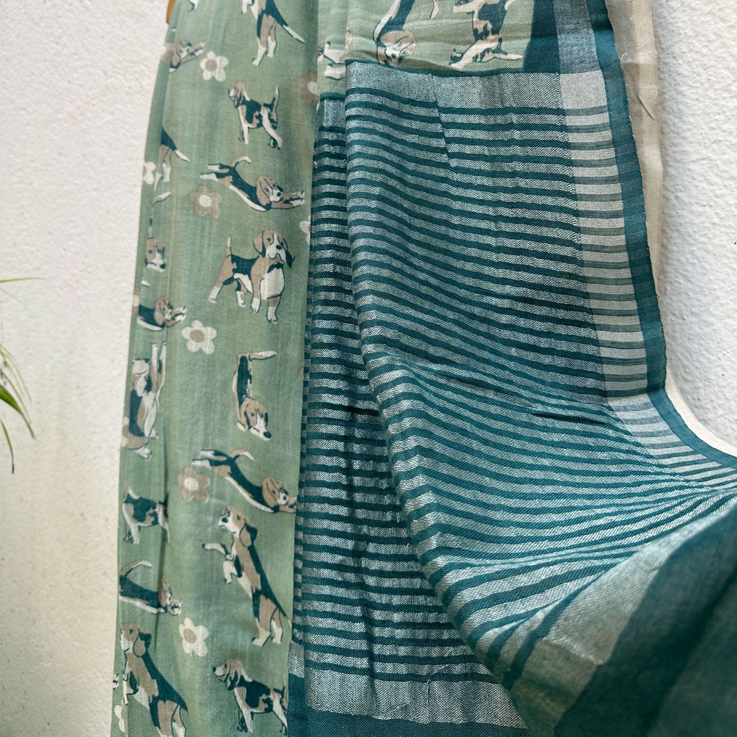 The Biscuit Hour sage green cotton beagle print saree with daisy florals and dark teal zari pallu, Zoomies Collection Thread Weavers
