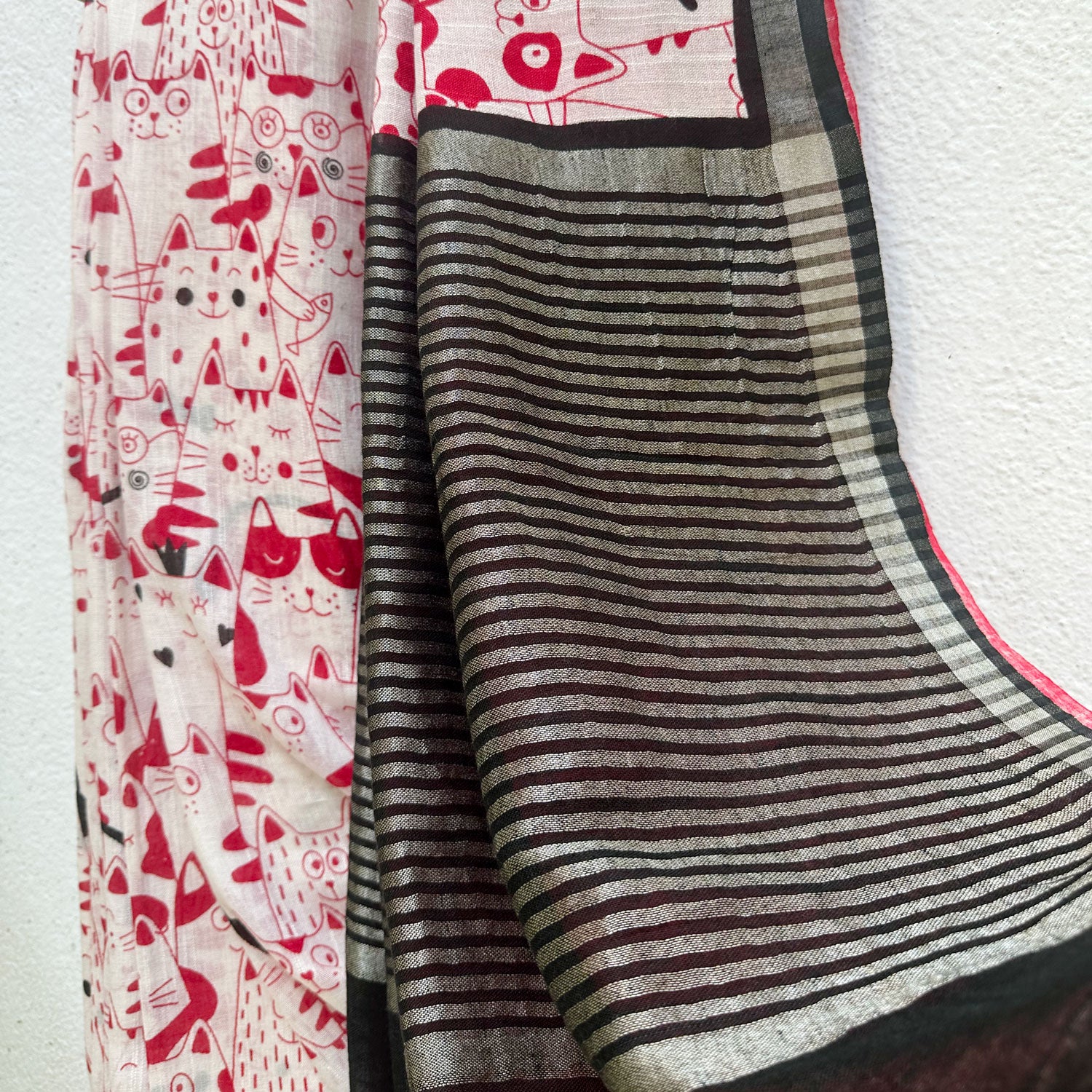 Whisker Theory ivory cotton saree with red illustrated cat crowd folk print and black zari pallu, Zoomies Collection Thread Weavers