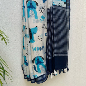 Woof & Wonder ivory cotton saree with blue illustrated dog and WOOF typography print and navy zari pallu, Zoomies Collection TTW