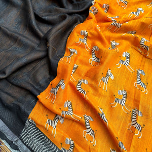 Zebra Cadabra orange printed cotton saree closeup with zebra motifs and grey border, by The Thread Weavers