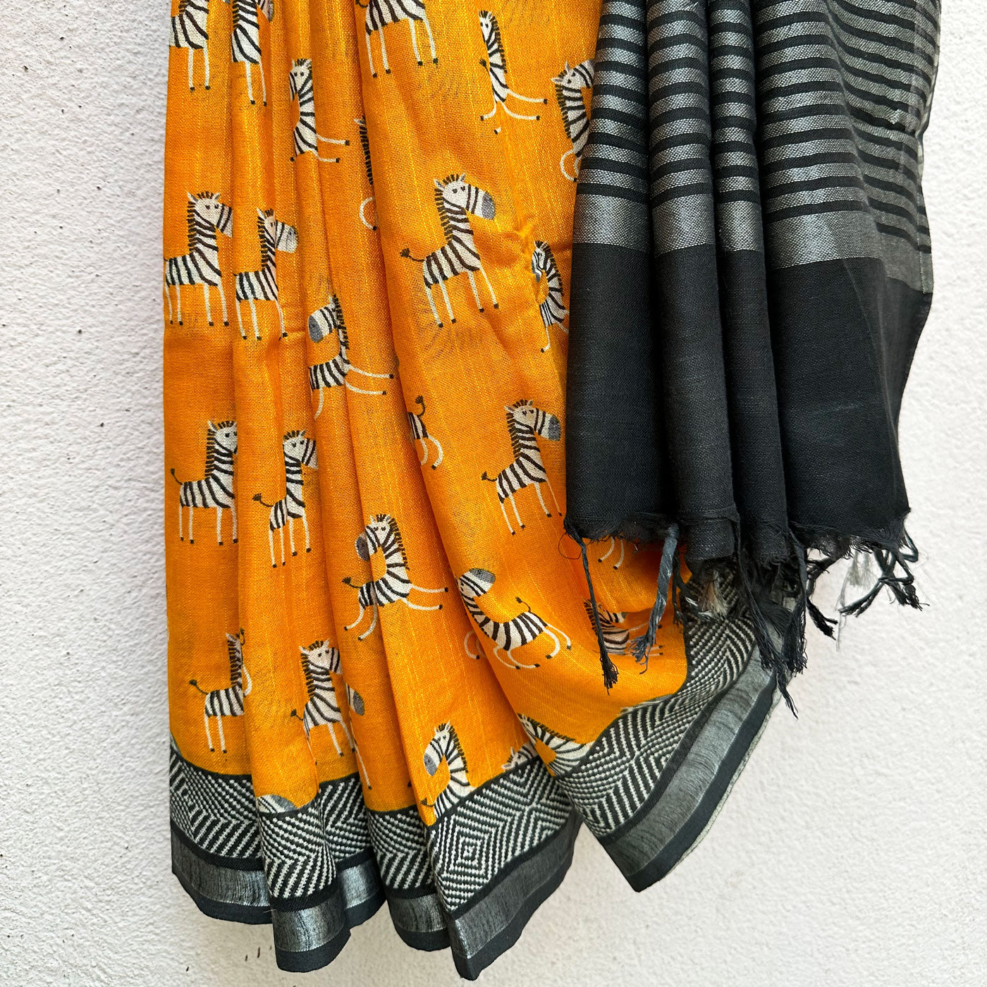 Zebra Cadabra orange printed cotton saree with zebra motifs and grey border, by The Thread Weavers
